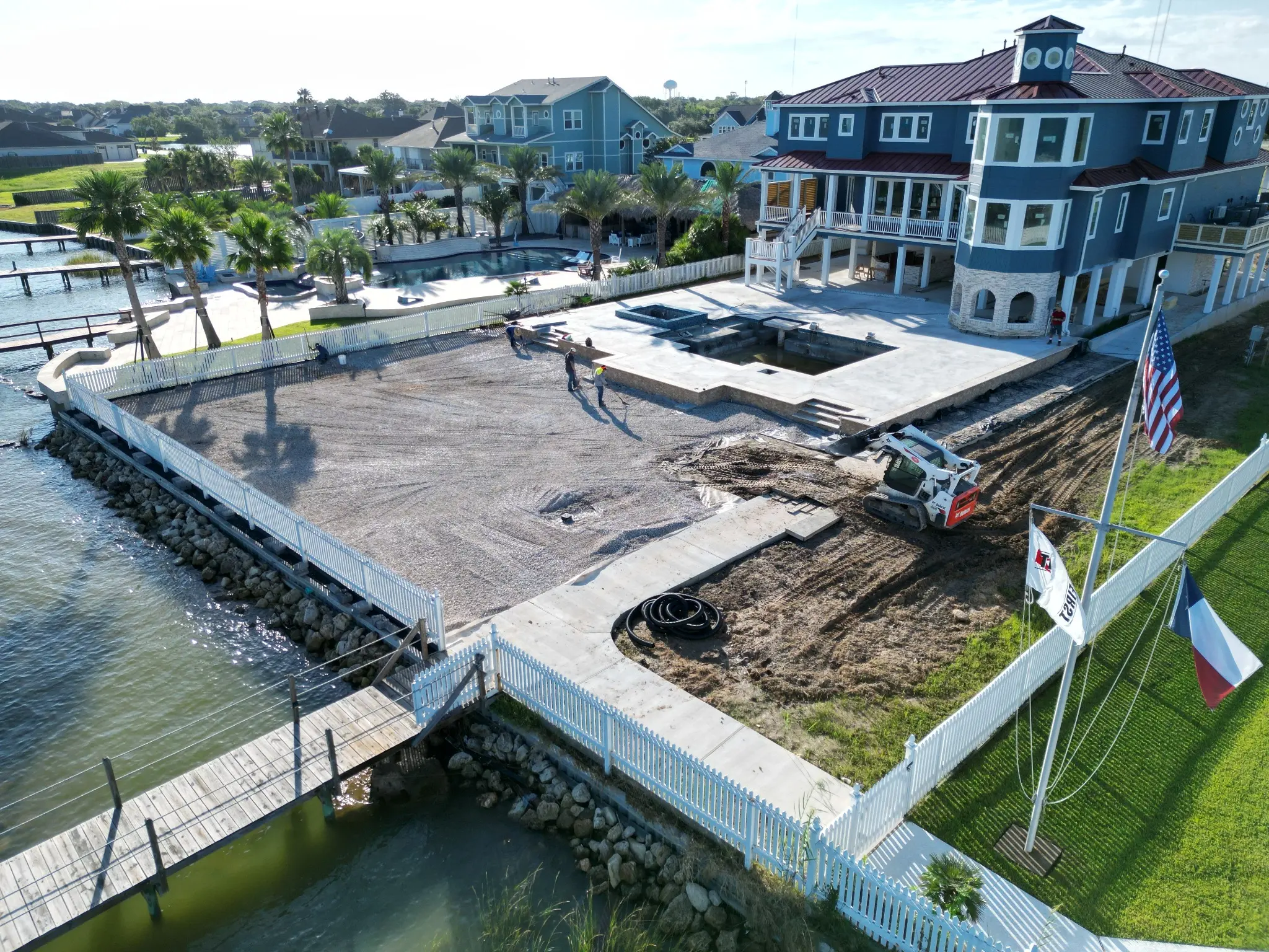 Large crushed-stone base prepared for the waterfront turf installation