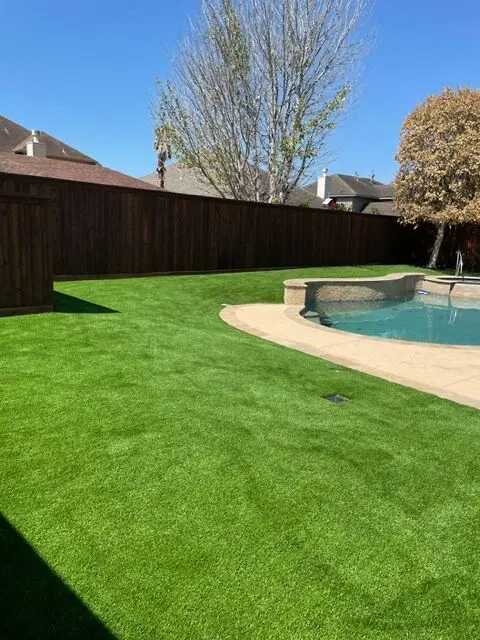 Finished poolside artificial grass installation in Houston