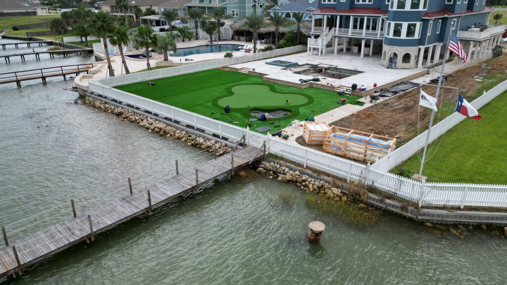 Backyard oasis with a custom Putting Green installed by Artificial Grass TX 